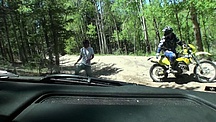Ethan Ever is surprised by a man on a motorcycle.